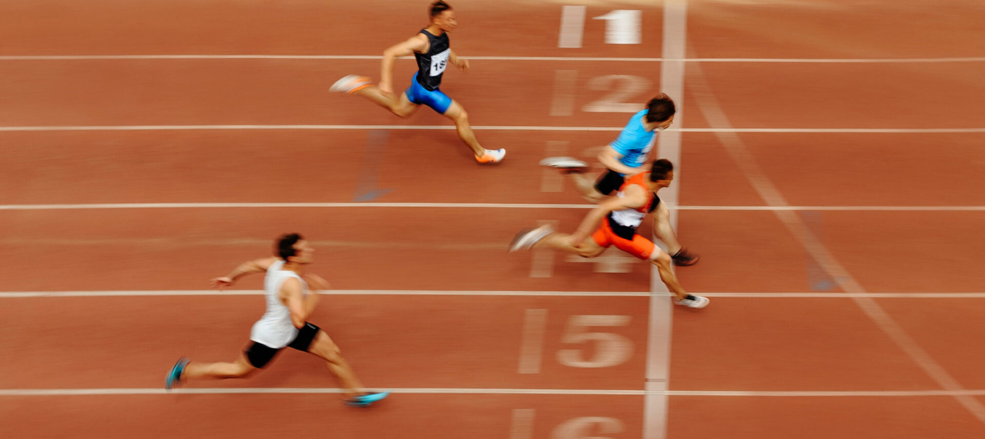 4 runners at the finish line