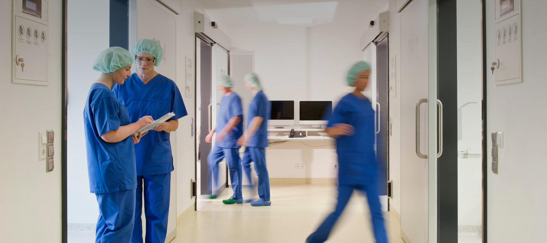 hospital staff in a hallway